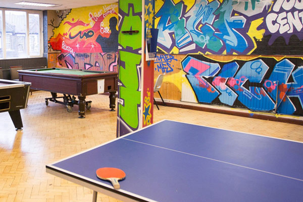 Table tennis table in youth club room