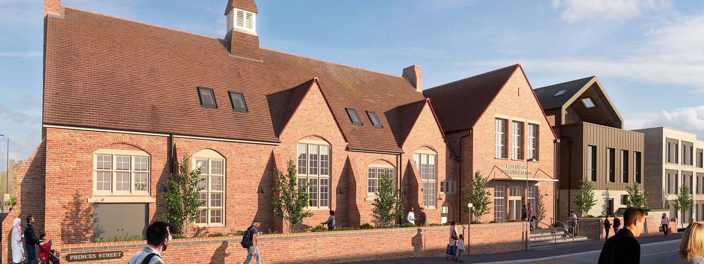 An artist&#039;s impression of what the developed East Oxford Community Centre could look like, showing the refurbished Old School building and the new three-storey building.