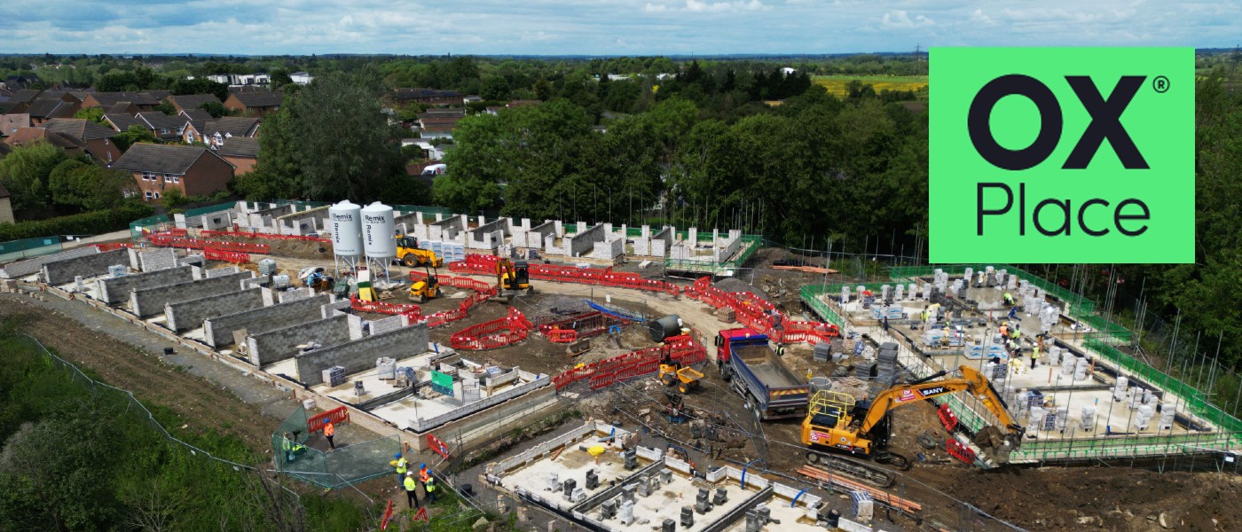 Aerial photo of new homes at Marston Paddock with OX Place logo superimposed