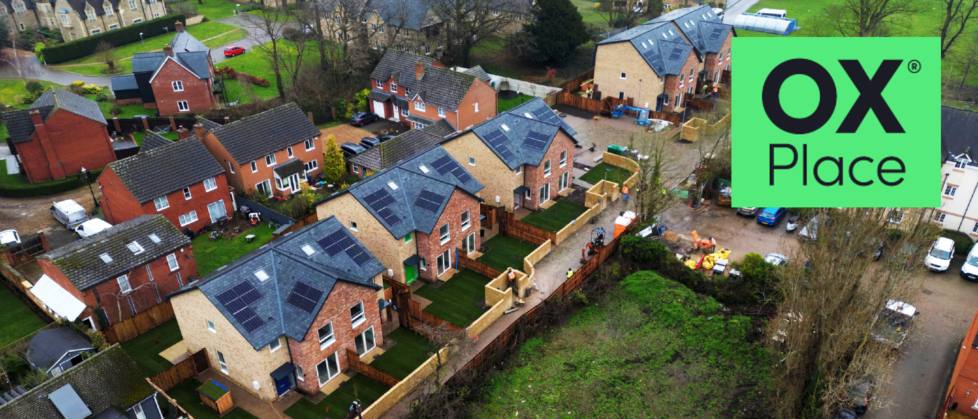 Aerial photo of new homes at Youngs Way, with OX Place logo